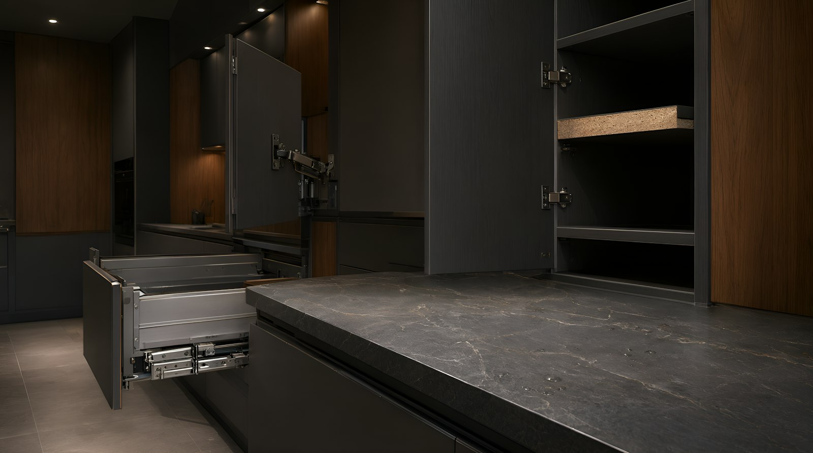 Soft-close drawer and hinge hardware in dark cabinetry