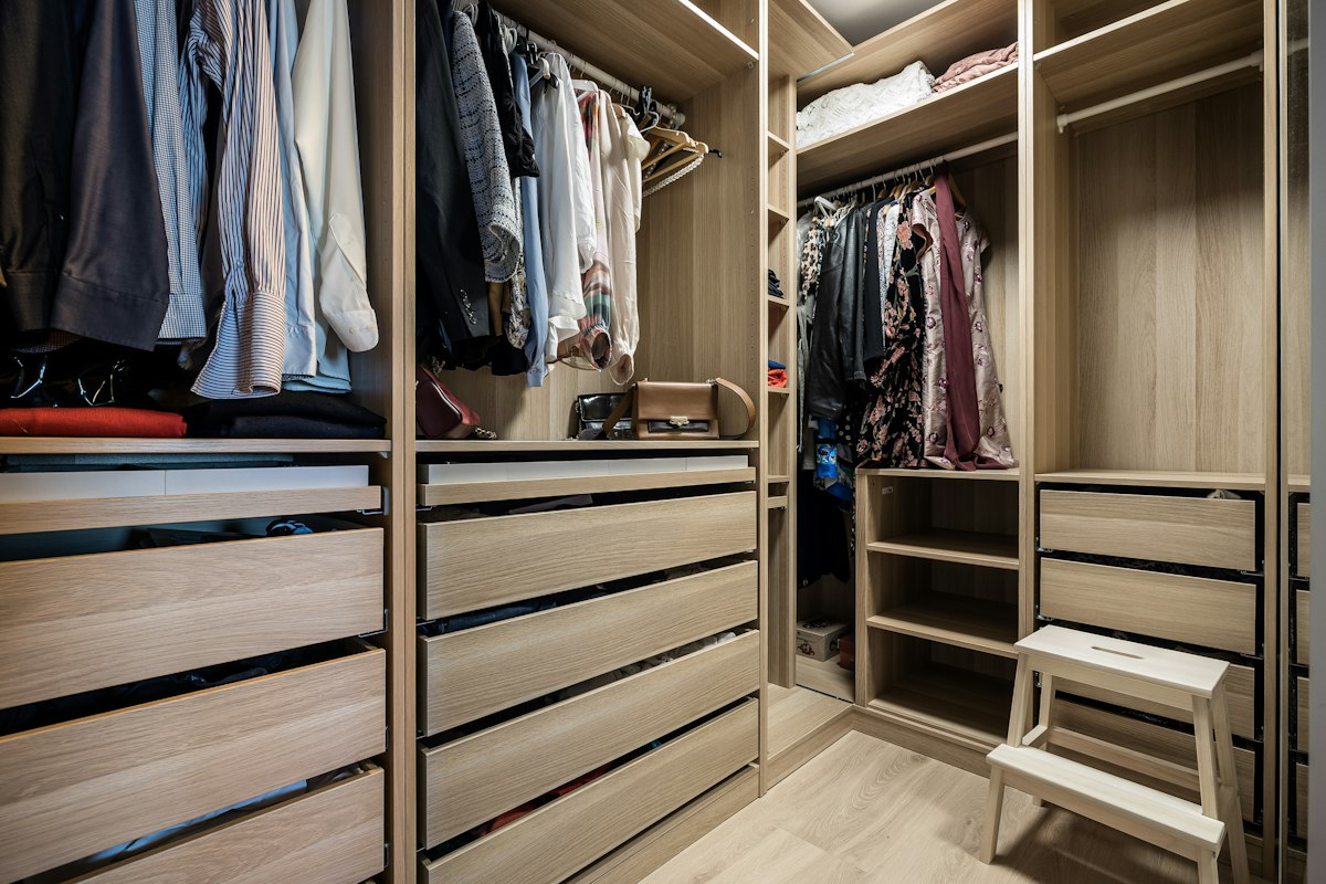 Walk-in wardrobe with timber drawers